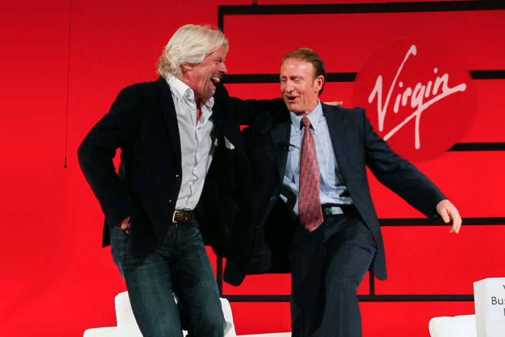 Sir Richard Branson and Mark Thompson on stage at the World Business Forum